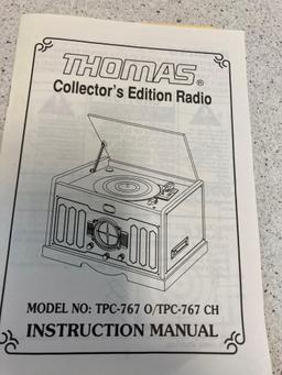 Thomas collectors edition radio black-and-white photo of an old home