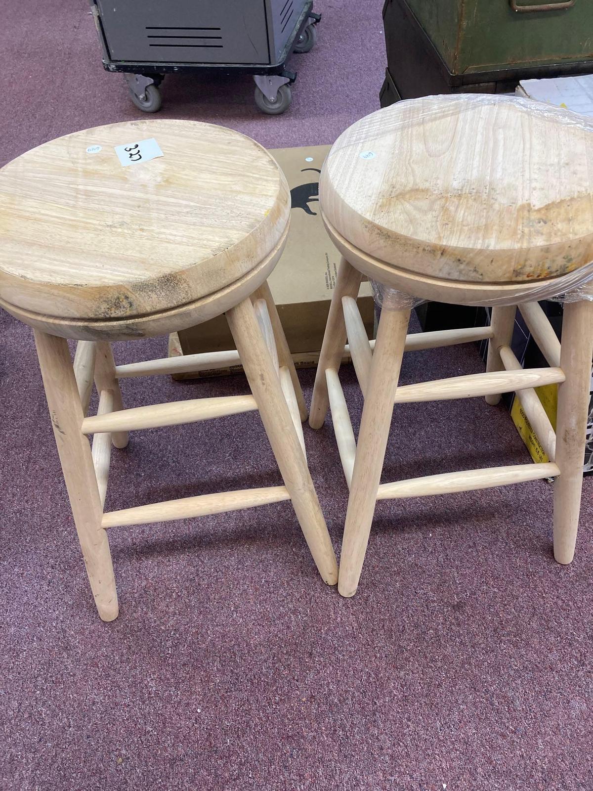 Two barstools swivel 25 inch seat height