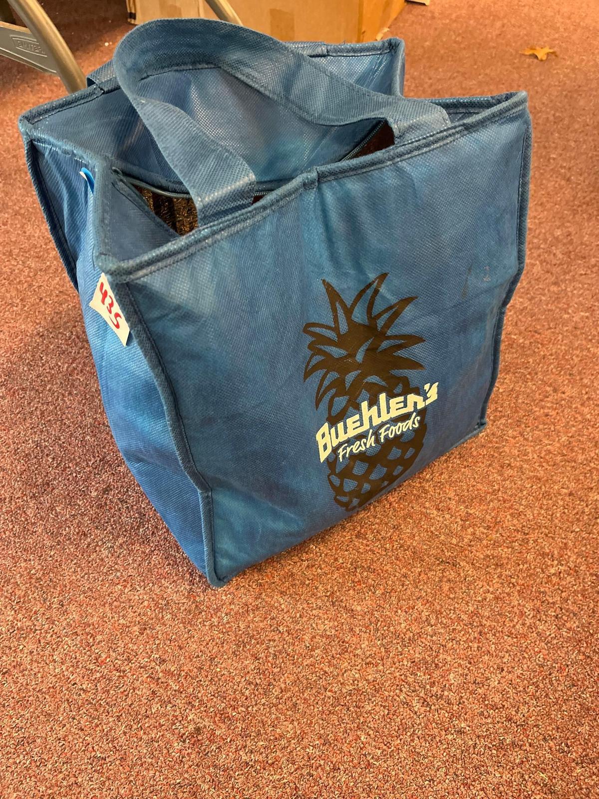 Insulated bag filled with ladies belts