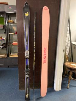 Pair of Logic skis one Traverse mountain ski and a hockey stick
