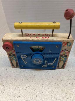 Four vintage toys Mattel Bugs Bunny music box Fisher Price chicken clock and radio