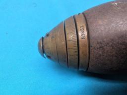 Cutaway old US artillery shell