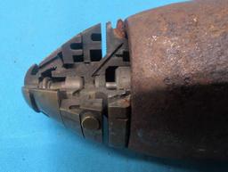 Cutaway old US artillery shell