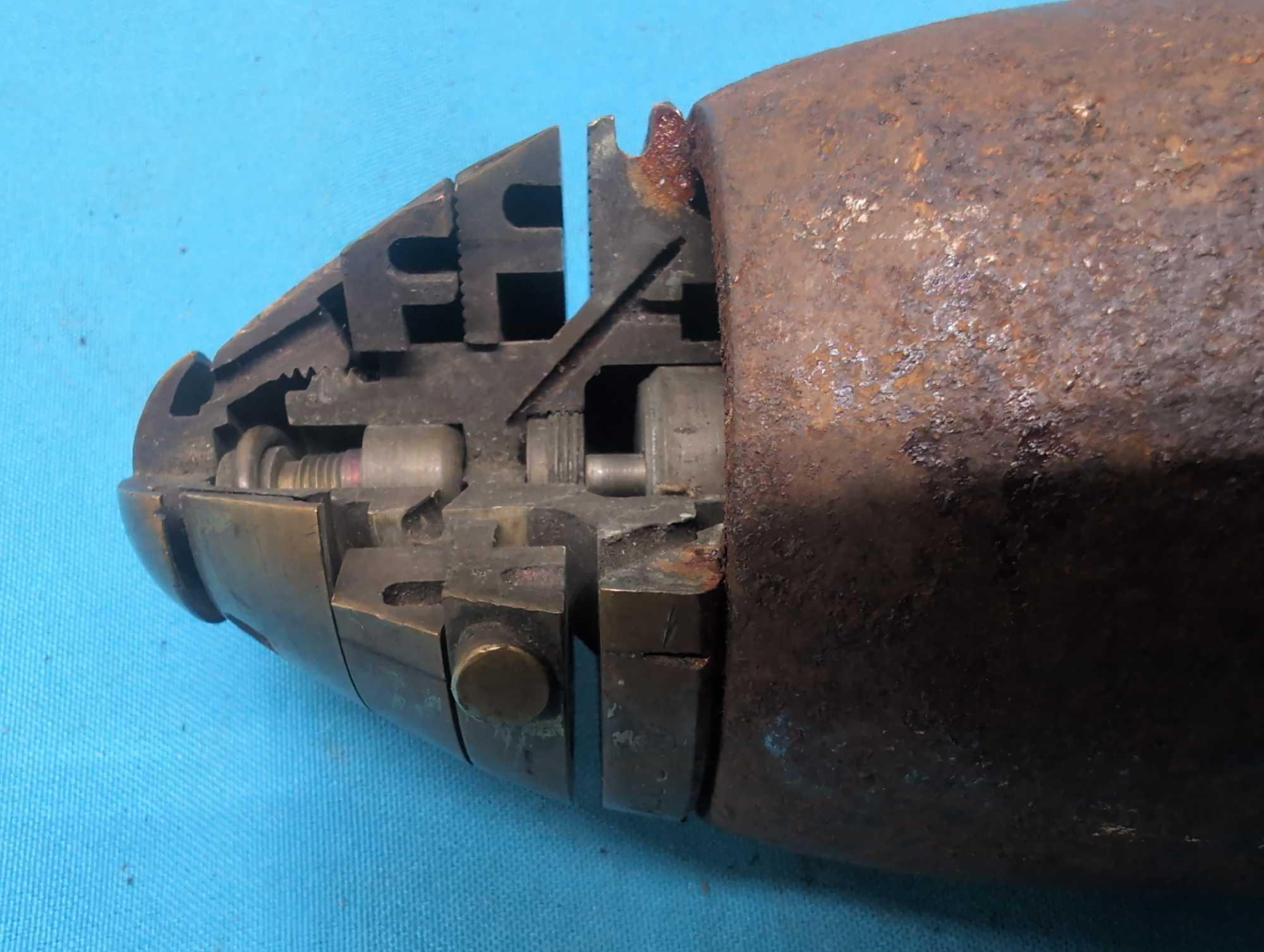 Cutaway old US artillery shell