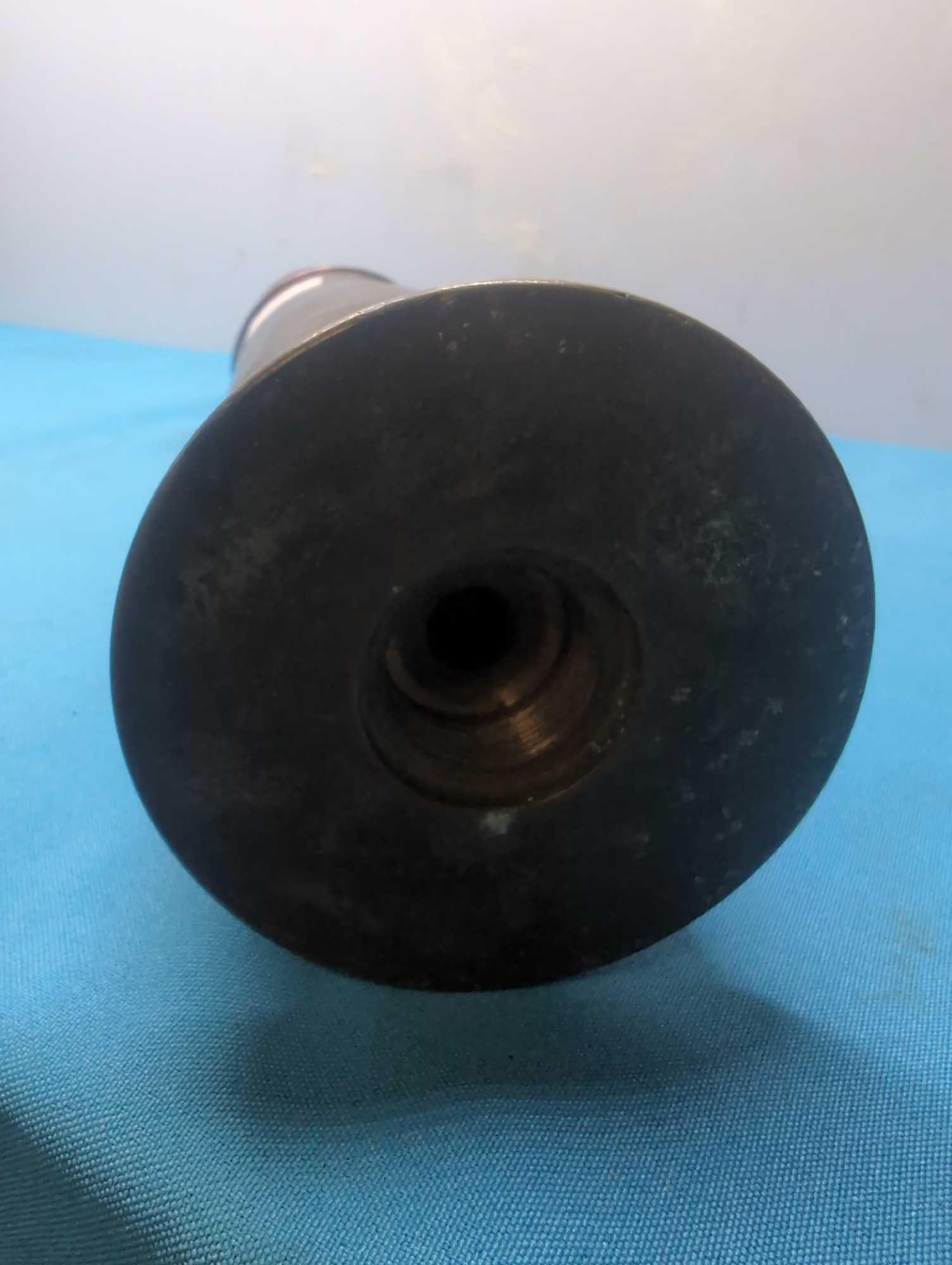 Cutaway old US artillery shell