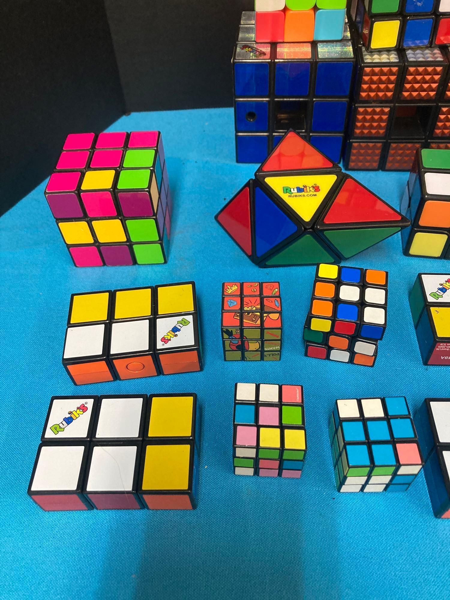 Rubik?s cube lot and soccer player figures