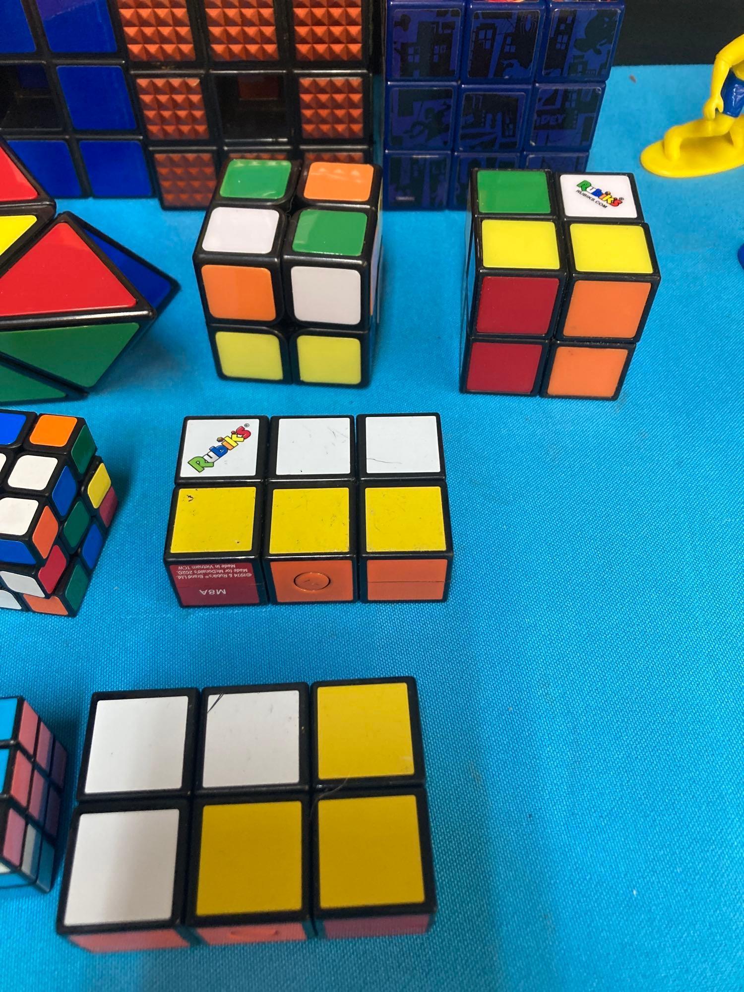Rubik?s cube lot and soccer player figures