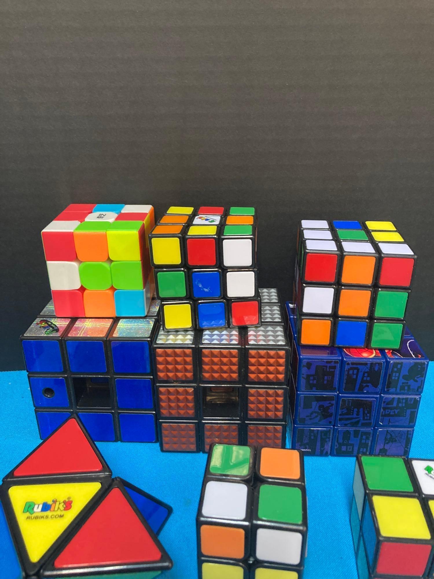 Rubik?s cube lot and soccer player figures