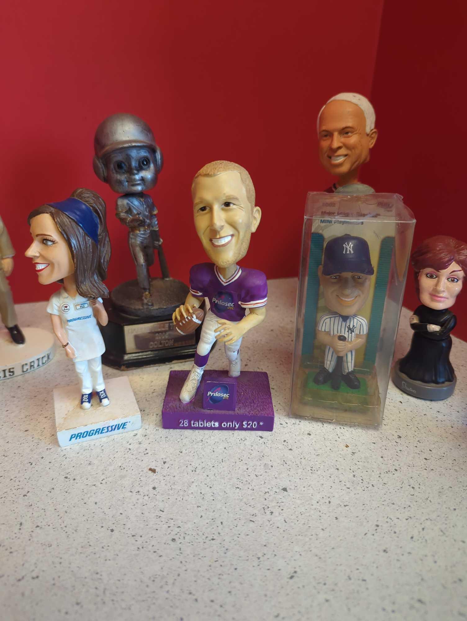 Bobbleheads-- all different, sports and genre