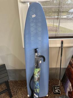 ironing board, umbrella, ice scraper
