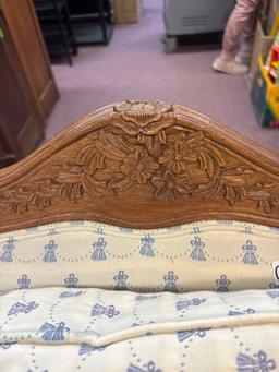 heavily carved slipper chair