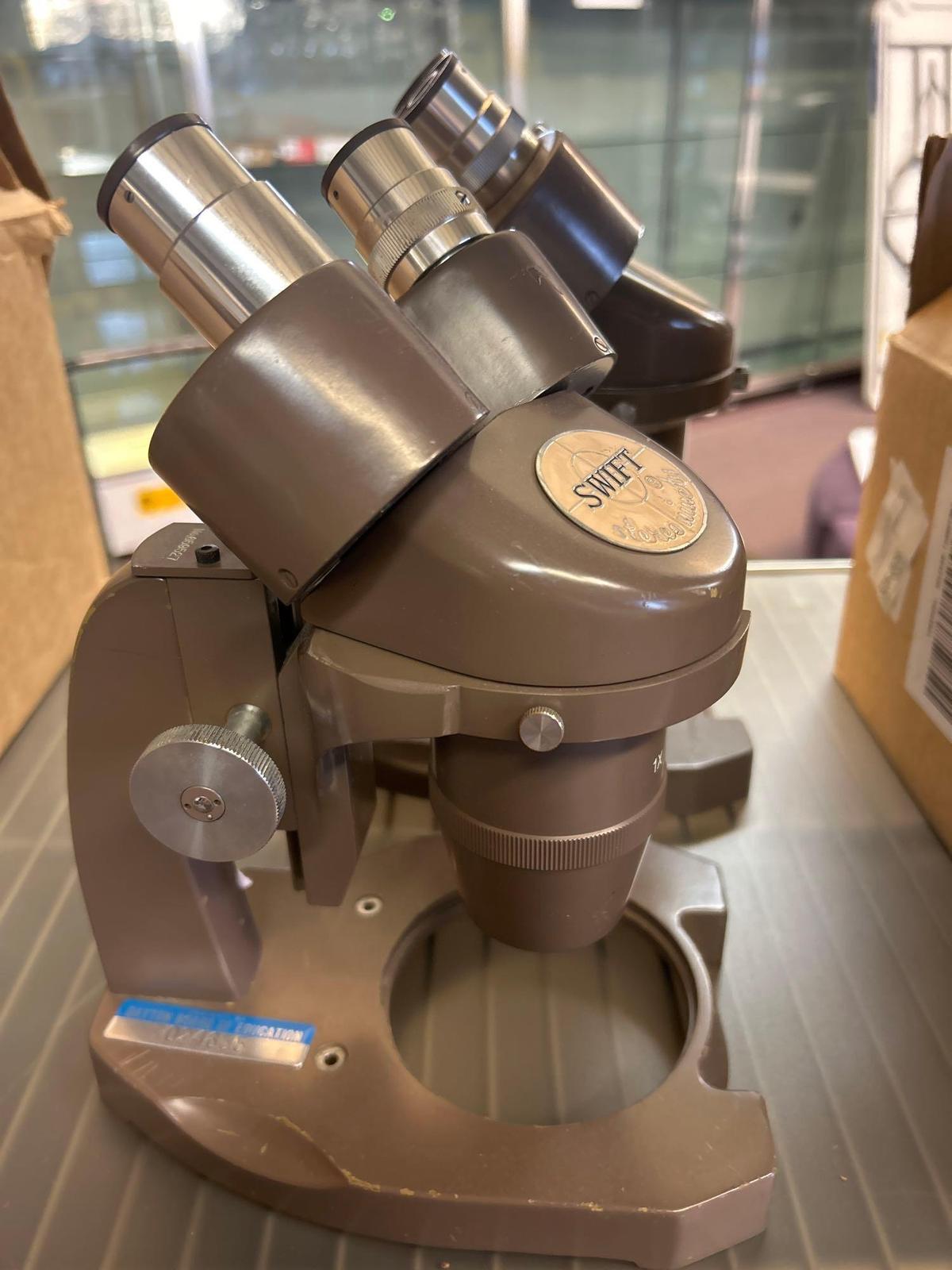 two swift stereo ninety microscopes
