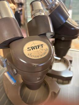 two swift stereo ninety microscopes