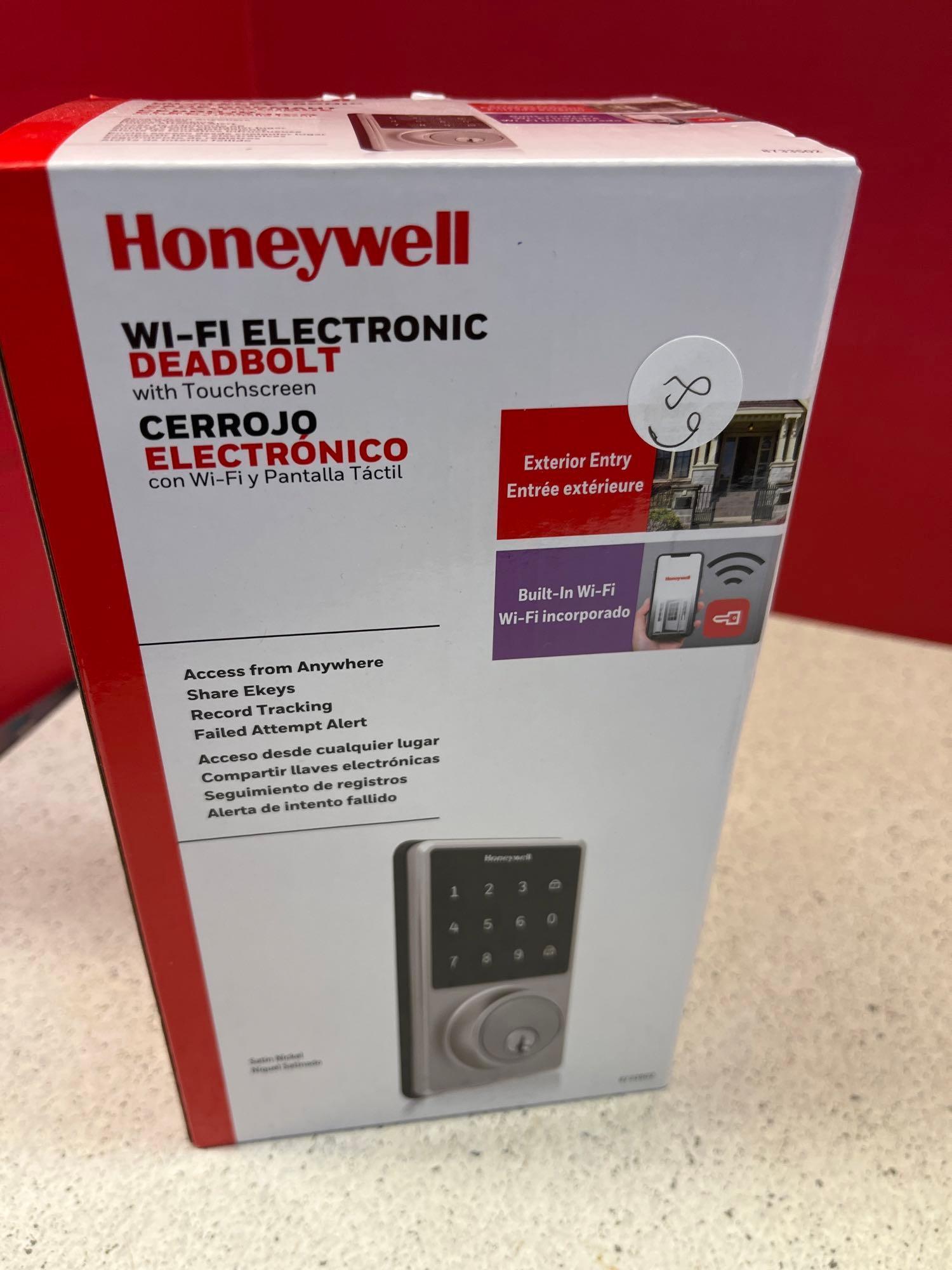 Open box Defiant Passage door knobs Honeywell Wi-Fi Electronic Deadbolt with touch screen and
