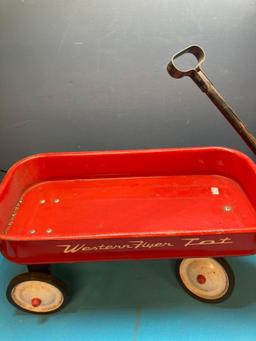 Children?s Western flyer wagon, metal wheelbarrow, and ironing board