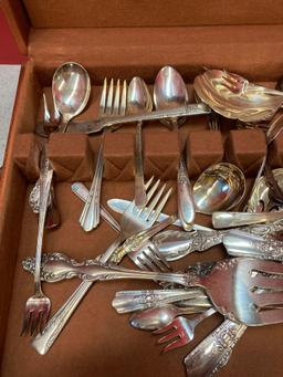 Miscellaneous silverware in chest