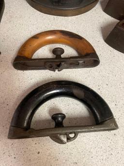Vintage sad irons and testing sieves