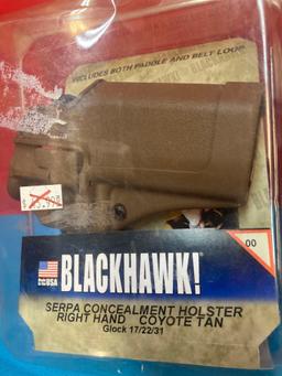 Two Blackhawk gun holsters