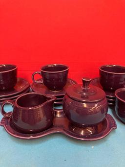 Nice lot of purple fiestaware cups and saucers, cream and sugar