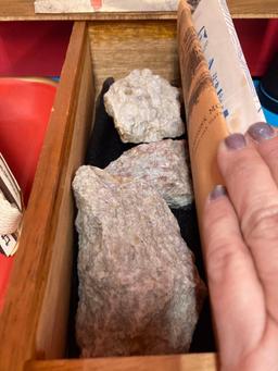 Lot of lighters on a vintage tray, binoculars and fossilized rocks