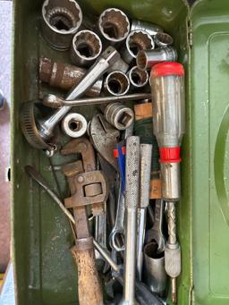 Four toolboxes with contents one has plumbing supplies