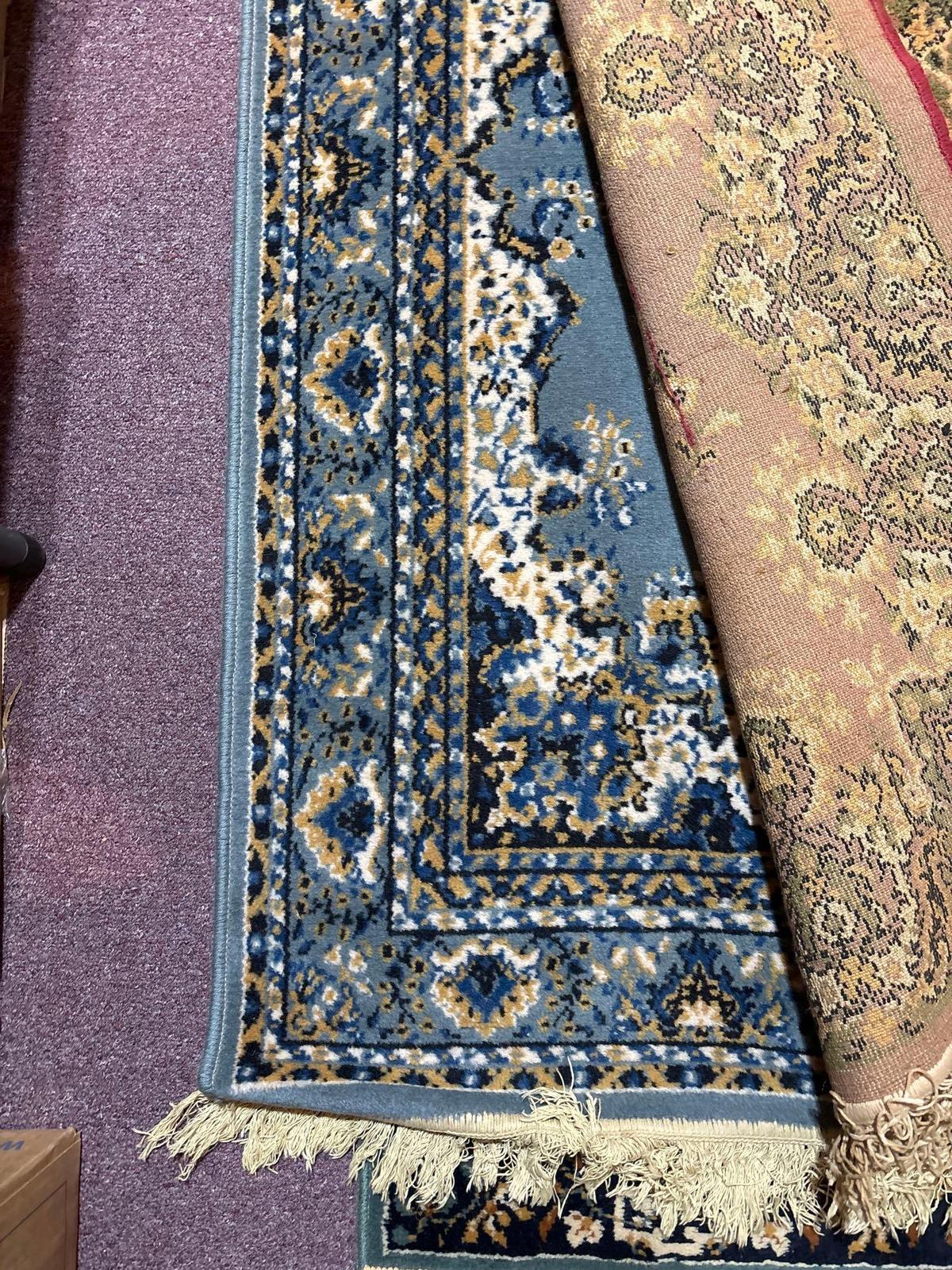 Three area rugs two runners