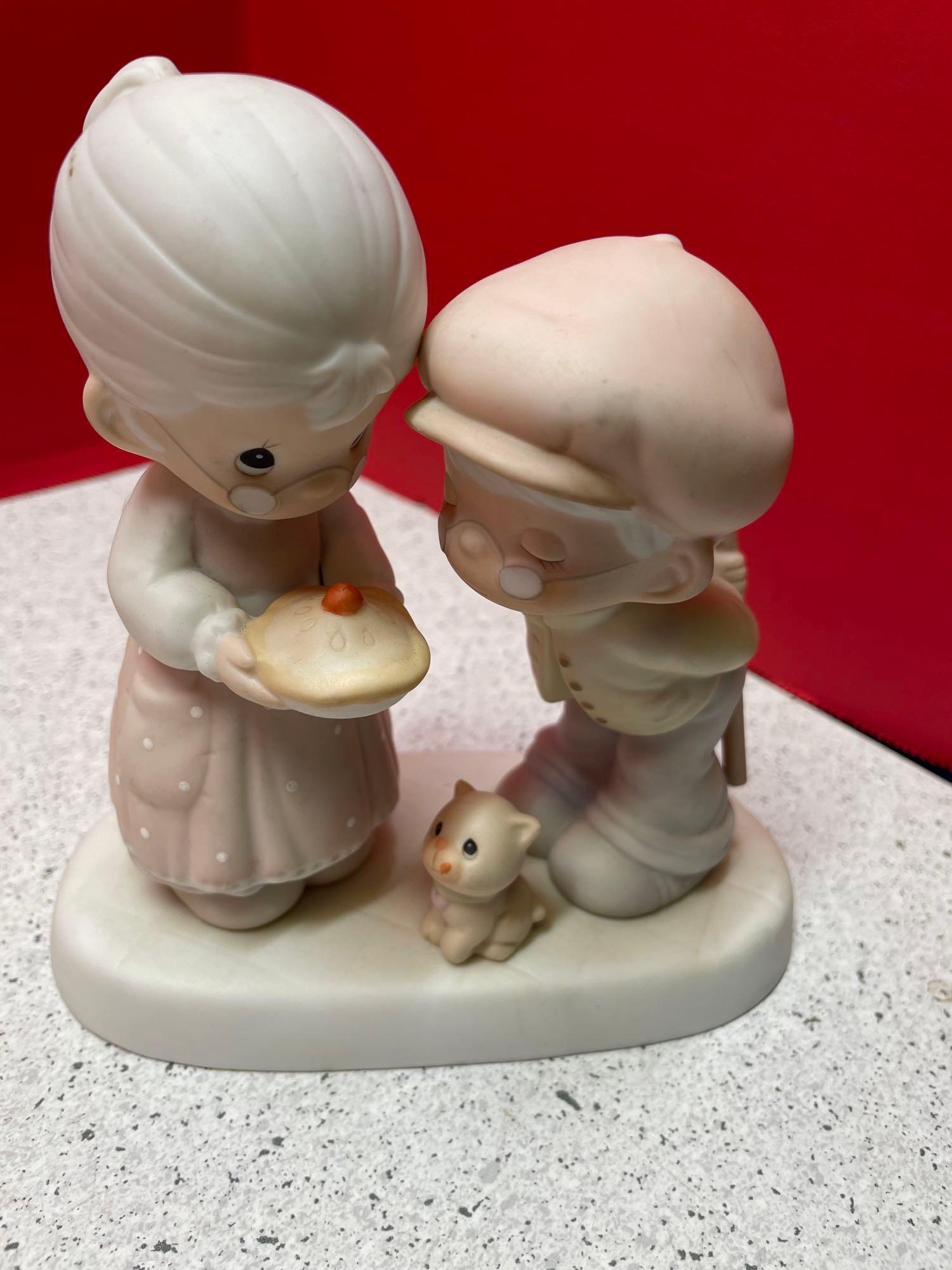 6 large precious moments figurines