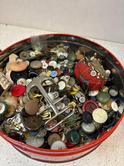 large tin of antique buttons