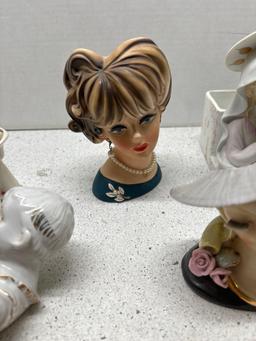 Lady head vases piano babies