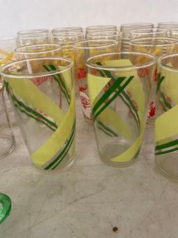 Vintage green glass snacker set in original box, Also vintage drinking glasses mid century Santa