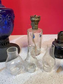 Kerosene lamp bases and vases, mainly smaller and cast-iron statue of liberty liberty bells