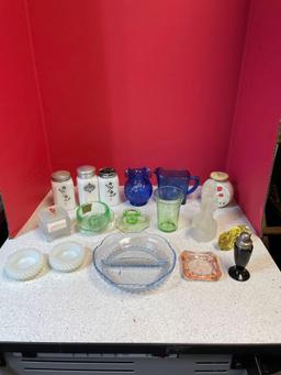 Vintage milk glass sugar, pepper shakers, blue glassware, green glassware, and hobnail ashtrays