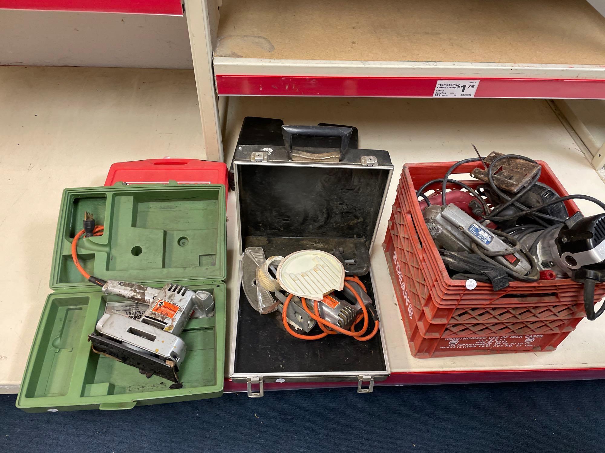 Various power tools including a saw