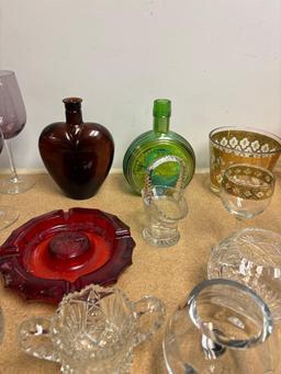 colored glass wine stems cut glass serving pieces ice bucket etc.