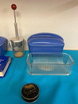 Hall refrigerator dishes along with other vintage kitchen items, cookie cutters, molds, cake