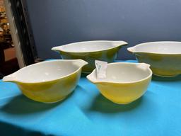 Green and yellow Pyrex Cinderella bowls