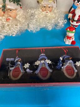 Christmas items including Kurt Adler Santa