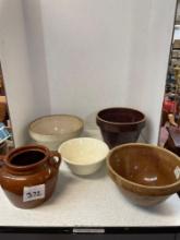 Pottery bowls and a crock