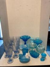 Blue glassware, including slag glass hen on nest also Fenton and blue glass goblets