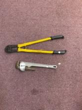 Bolt cutter and an 18 inch alum pipe wrench