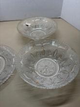 large tote of clear glass bowls dishes