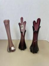 Three purple stretch vases