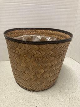 Two windchimes and a basket that could be used for a planter