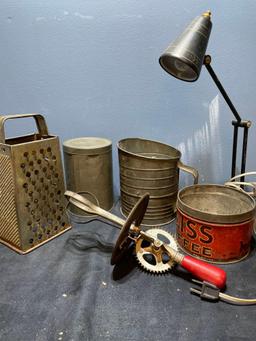 vintage tin kitchen utensils and desk lamp