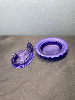 Cobalt blue hen on nest