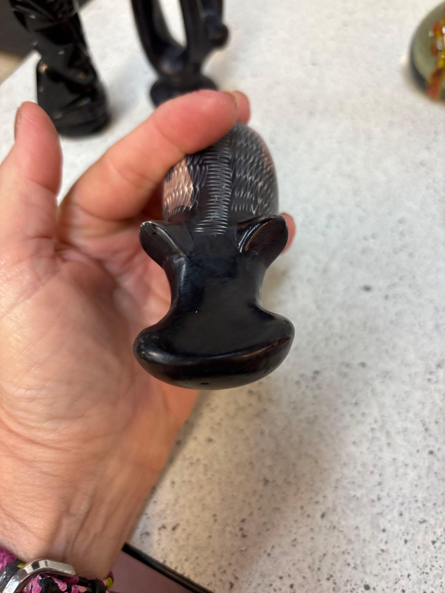 Mother and child soapstone, and a hippo soapstone, Black onyx, Mayan figure, And two paperweights