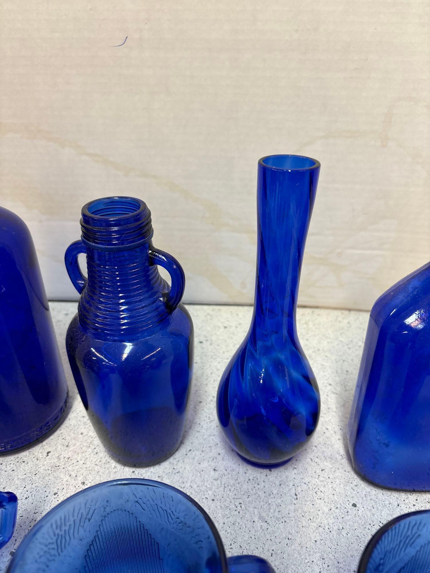 Cobalt blue bottles and cups one vase 14 total