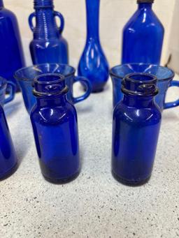 Cobalt blue bottles and cups one vase 14 total