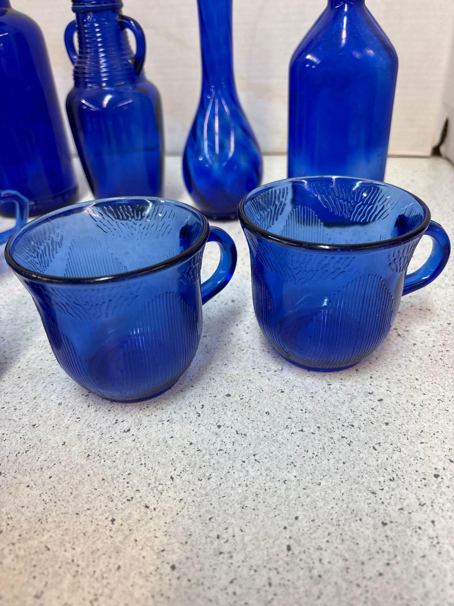 Cobalt blue bottles and cups one vase 14 total