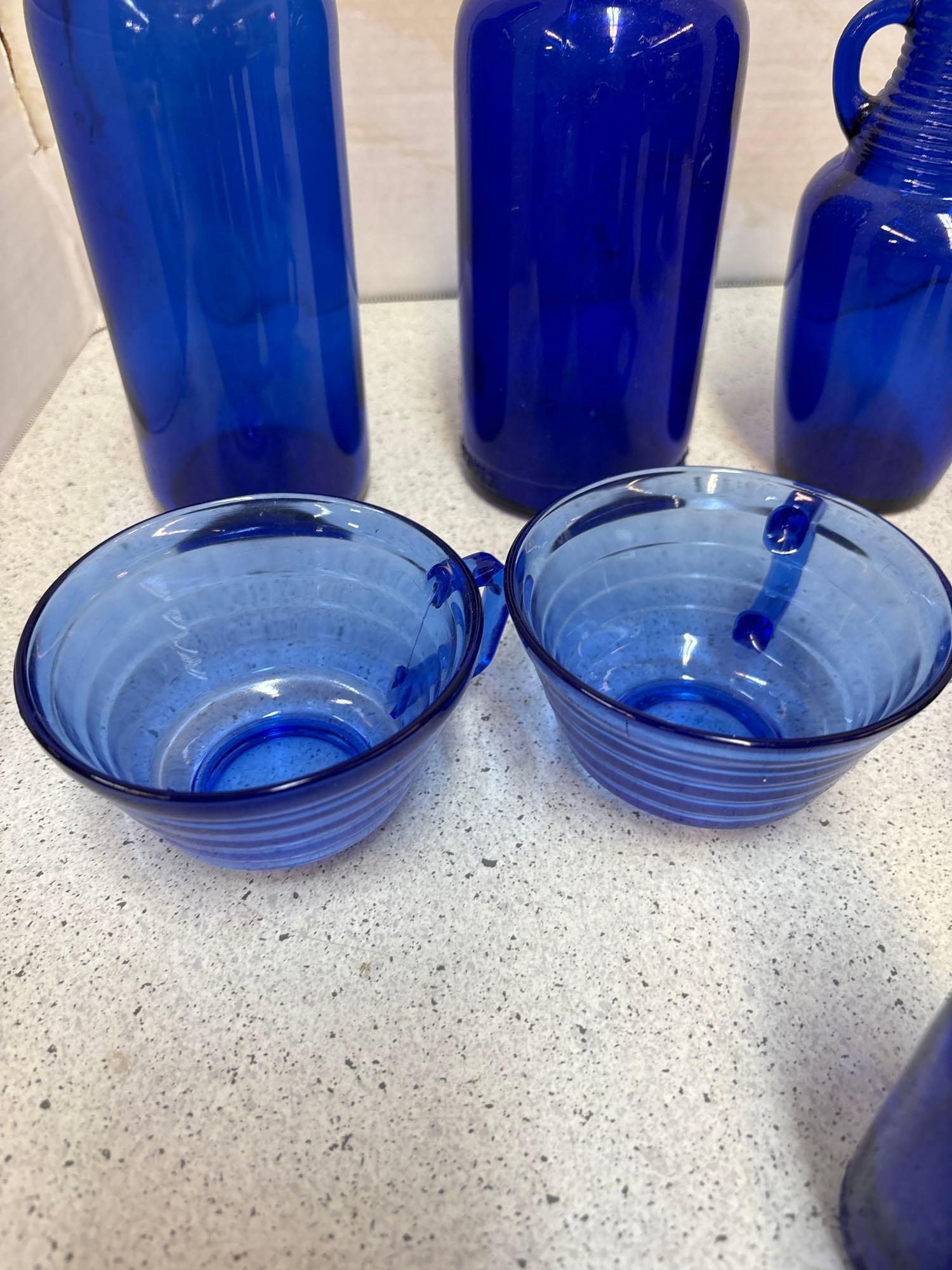 Cobalt blue bottles and cups one vase 14 total